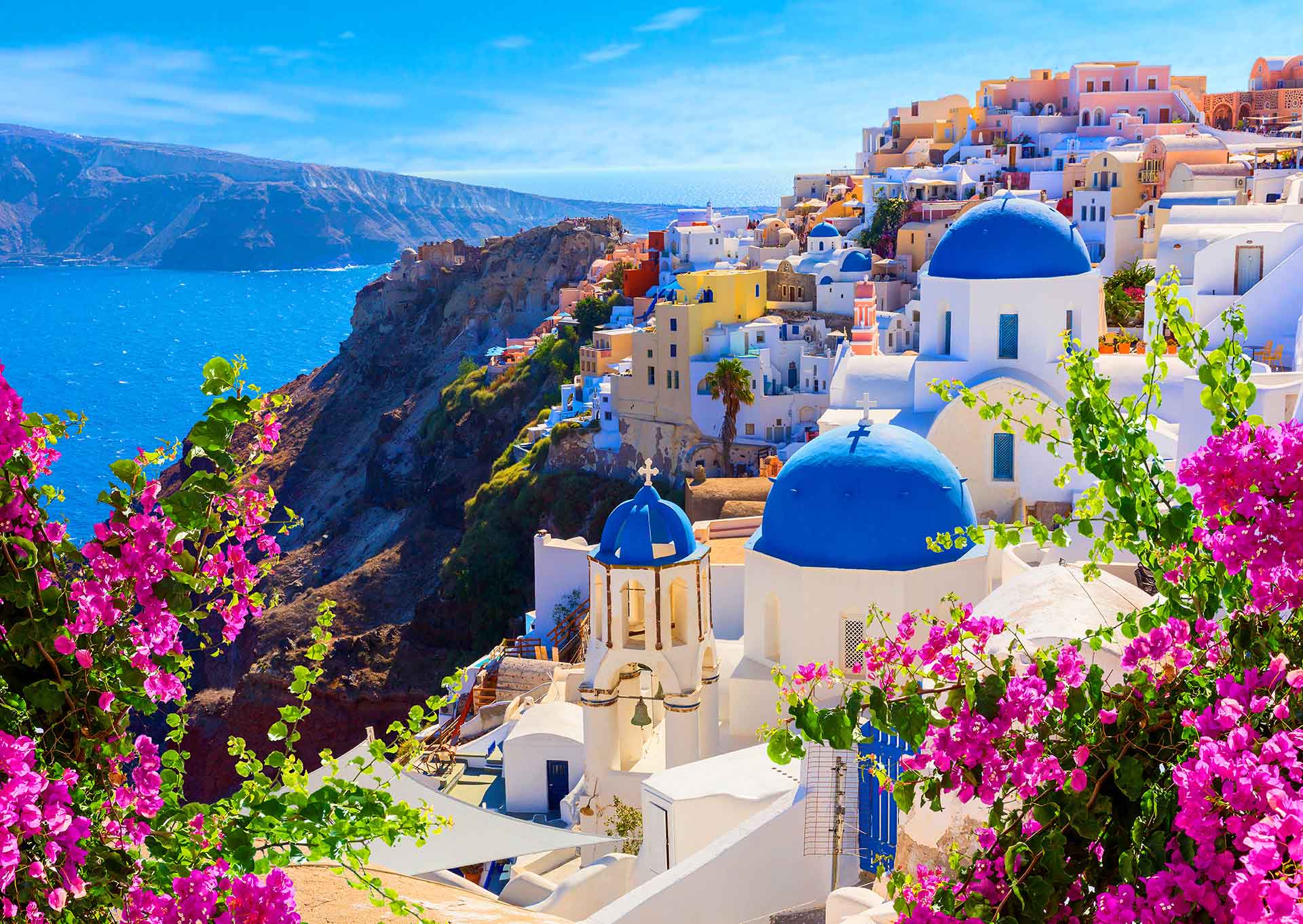 Puzzle Enjoy Vista de Santorini con Flores, Grecia de 1000 Pzs