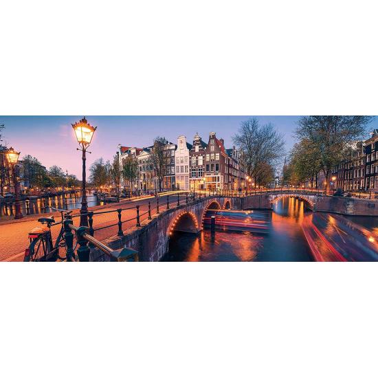 Puzzle Ravensburger Panorama Atardecer en Amsterdam de 1000 Pzs